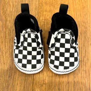Classic black and white slip on vans crib shoes